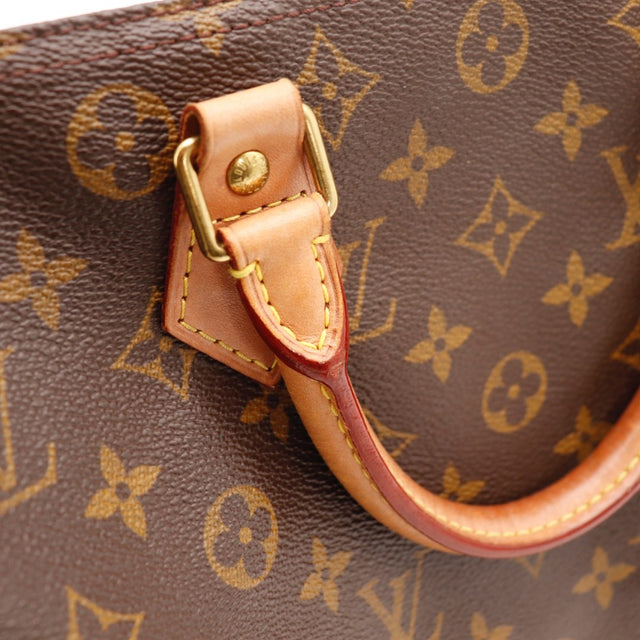 Détail de la fermeture Louis Vuitton Speedy 30 Toile Monogramme occasion authentique — AMANA Vintage