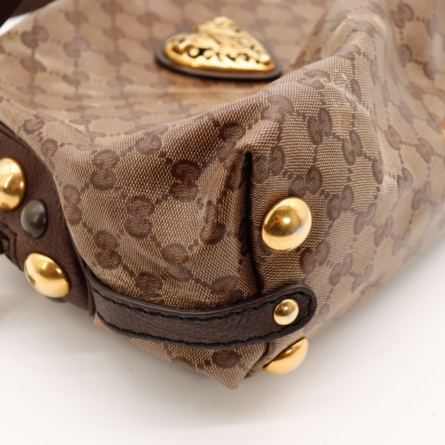 Détail coin et clous dorés Gucci Babouska occasion authentique — AMANA Vintage
