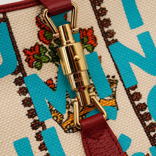 Détail fermoir piston doré Gucci Jackie 1961 Music Is Mine brillant sans usure — AMANA Vintage