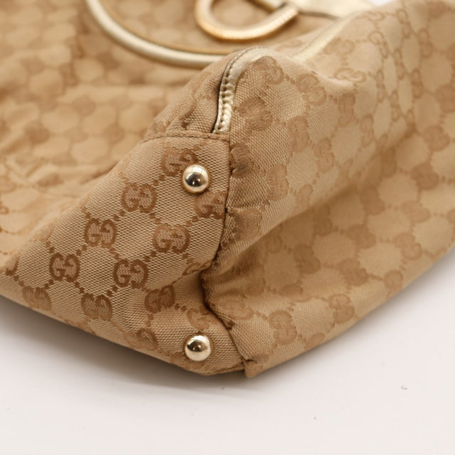 Détail coin inférieur sac Gucci Hobo — AMANA Vintage