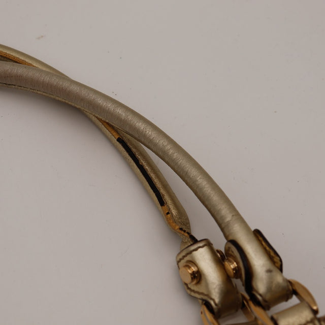 Détail anse en cuir doré avec craquelures sac Gucci Hobo — AMANA Vintage