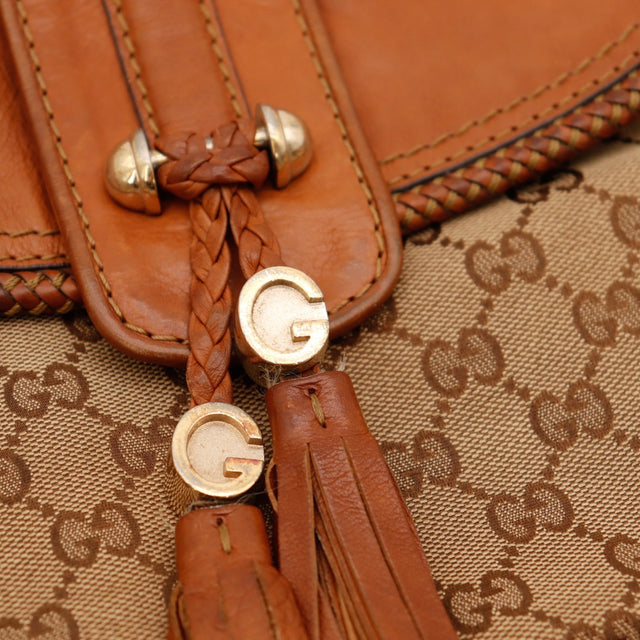 Détail pampilles G doré Gucci Hobo occasion authentique — AMANA Vintage