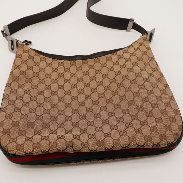 Vue du dessous Gucci Hobo Web toile monogrammée beige et ébène occasion authentique — AMANA Vintage