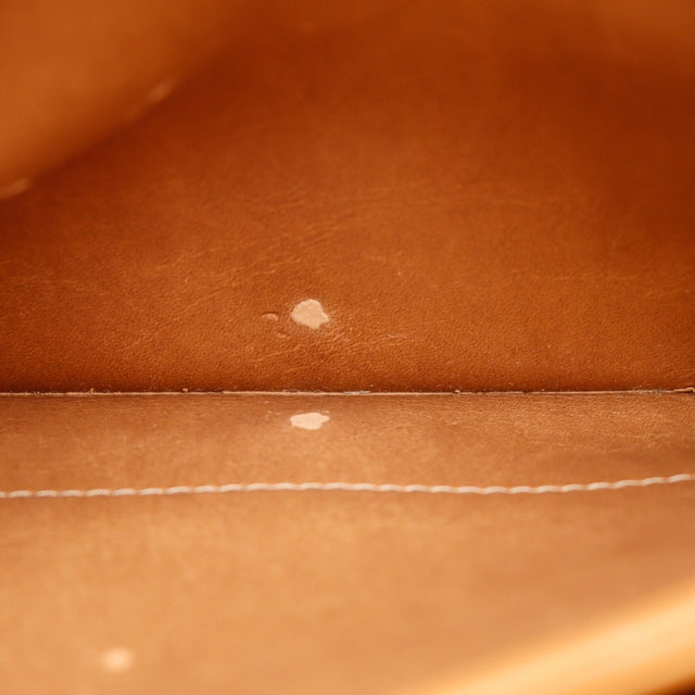 Gros plan toile Honeycomb et cuir cognac pochette Christian Dior occasion — AMANA Vintage