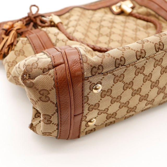 Détail coin et finition cuir Gucci Hobo occasion authentique — AMANA Vintage