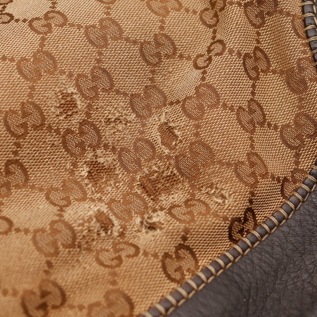 Détail accroc toile monogrammée Gucci New Jackie occasion authentique — AMANA Vintage
