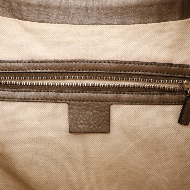 Détail coin toile monogrammée Gucci Hobo Bamboo occasion authentique — AMANA Vintage