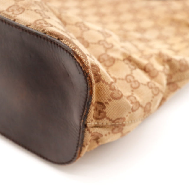 Détail base cuir foncé Gucci Hobo occasion authentique — AMANA Vintage