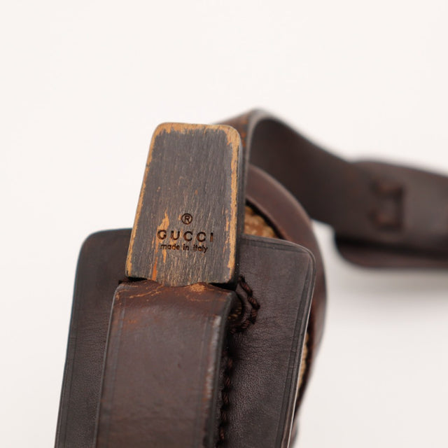 Détail embout bois signé Gucci made in Italy Hobo occasion authentique — AMANA Vintage