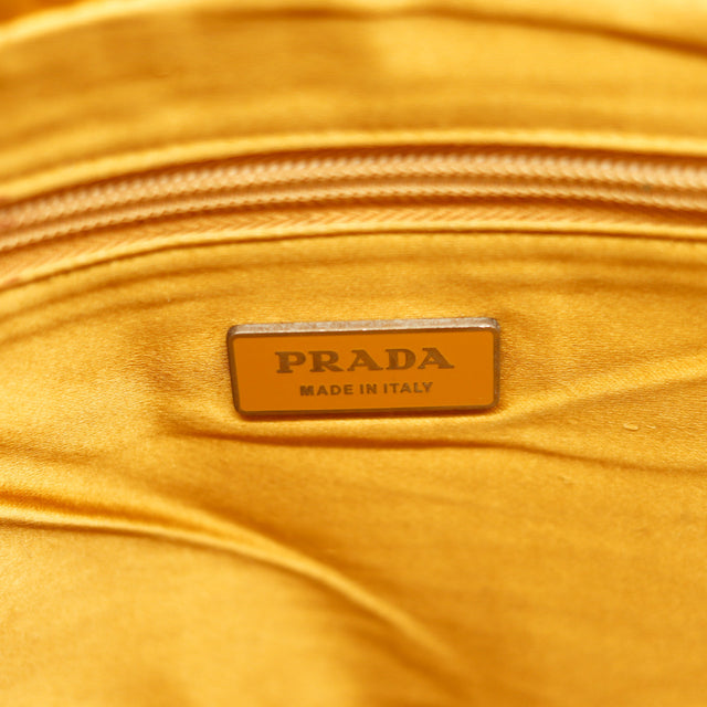 The Prada Clutch